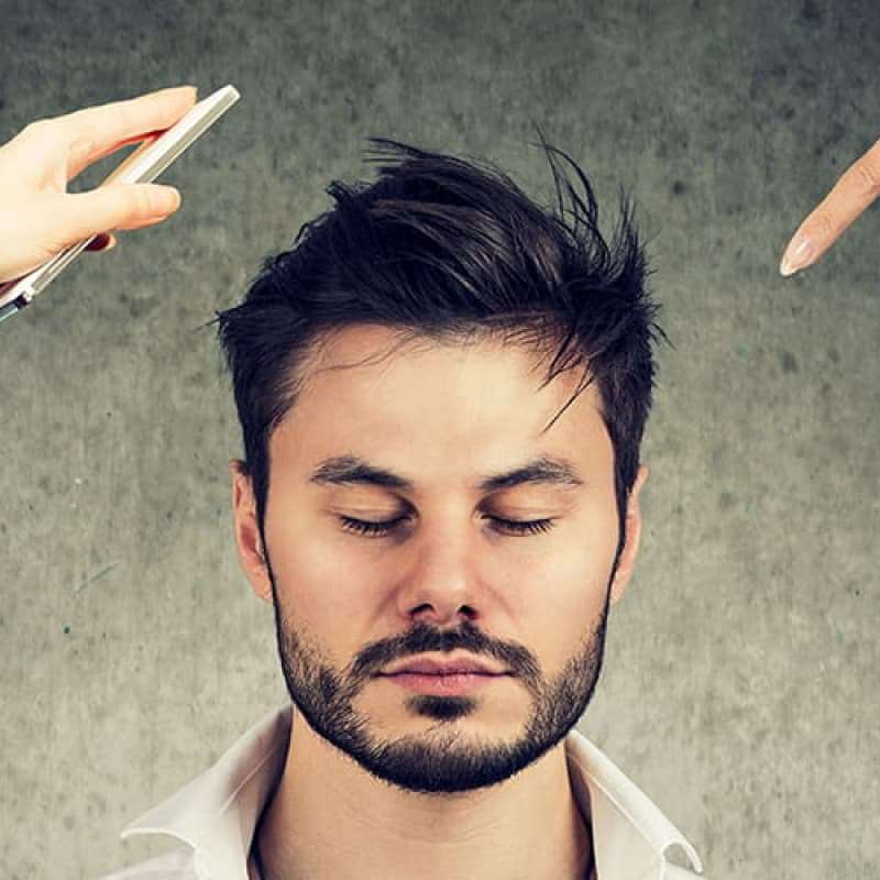 Master stress in 7 steps, middle aged bearded man looking zen as people are offering his distractions | e-Surgery