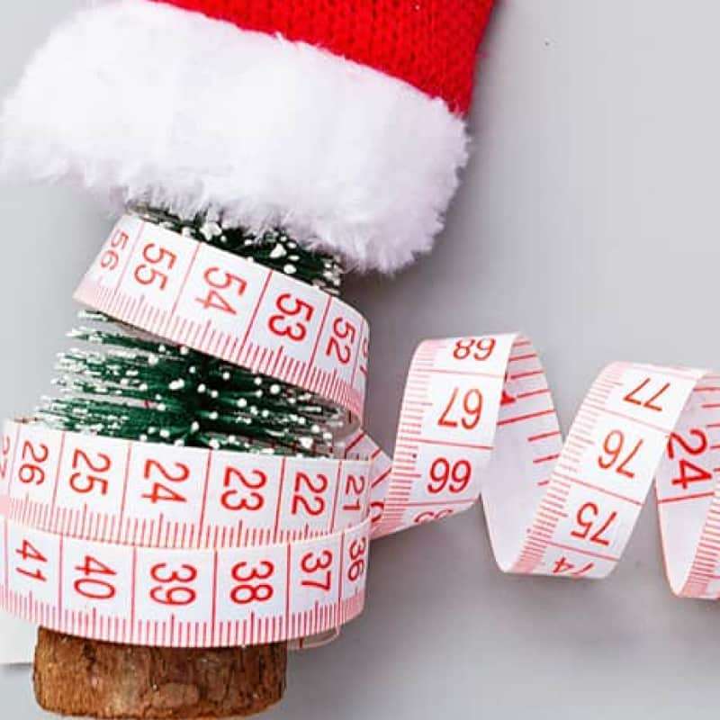 Post holiday diets, christmas tree with a measuring tape, e-Surgery