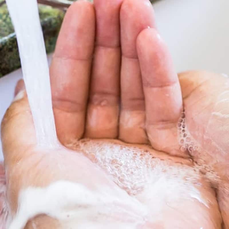 How to wash your hands, image of person washing hands in warm, soapy water for 20 seconds, e-Surgery