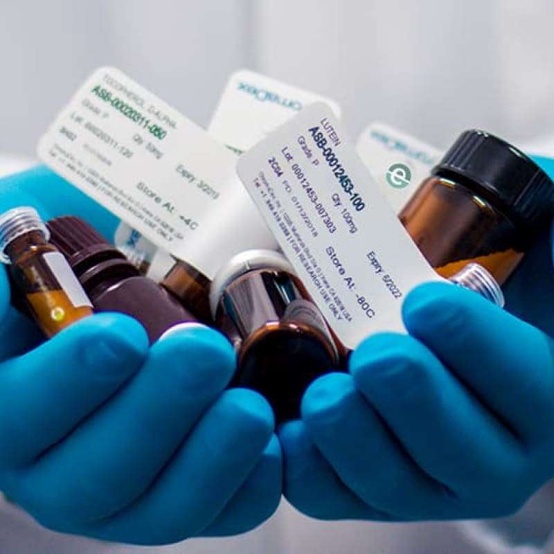 Might Brexit Affect Your Prescriptions? Possible Medication Shortage List. Dr in a white lab coat holding medication in gloved hands | e-Surgery