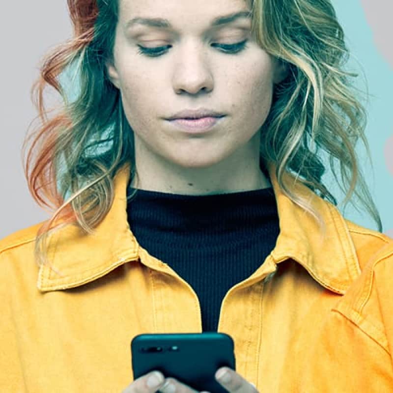 Young woman on phone, one version is happy and smiling the other looks anxious, social media in lockdown, e-Surgery
