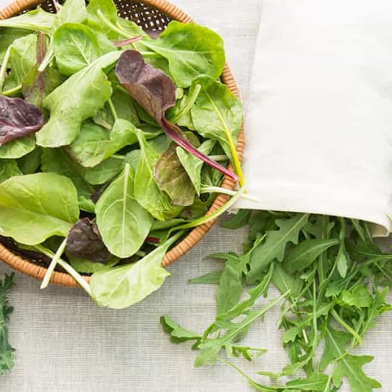 Vegan for a month, image of green leafy vegetables on white table, e-Surgery