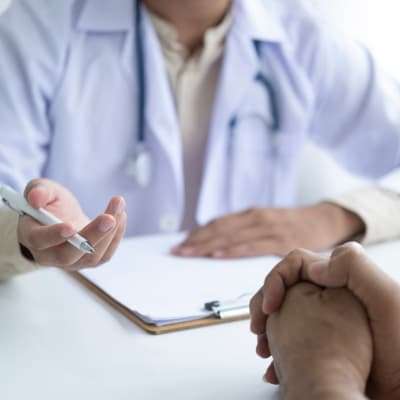 doctor prescribing amitriptyline to patient | e-surgery
