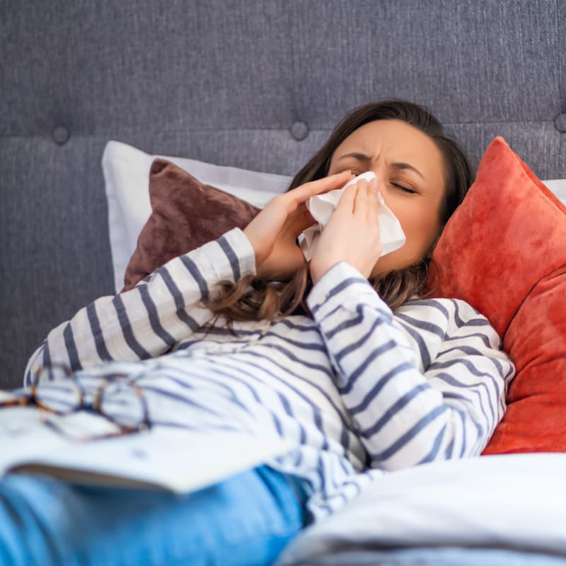 woman suffering from allergies Hay Fever Symptoms Vs. Covid Symptoms: how to tell the difference |e-surgery