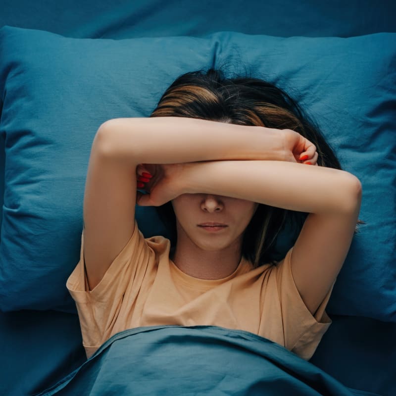 A woman using the best triptan for migraines